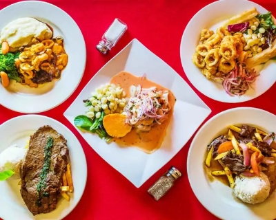 Traveler enjoying affordable and delicious dining in Lima's Miraflores and Barranco.